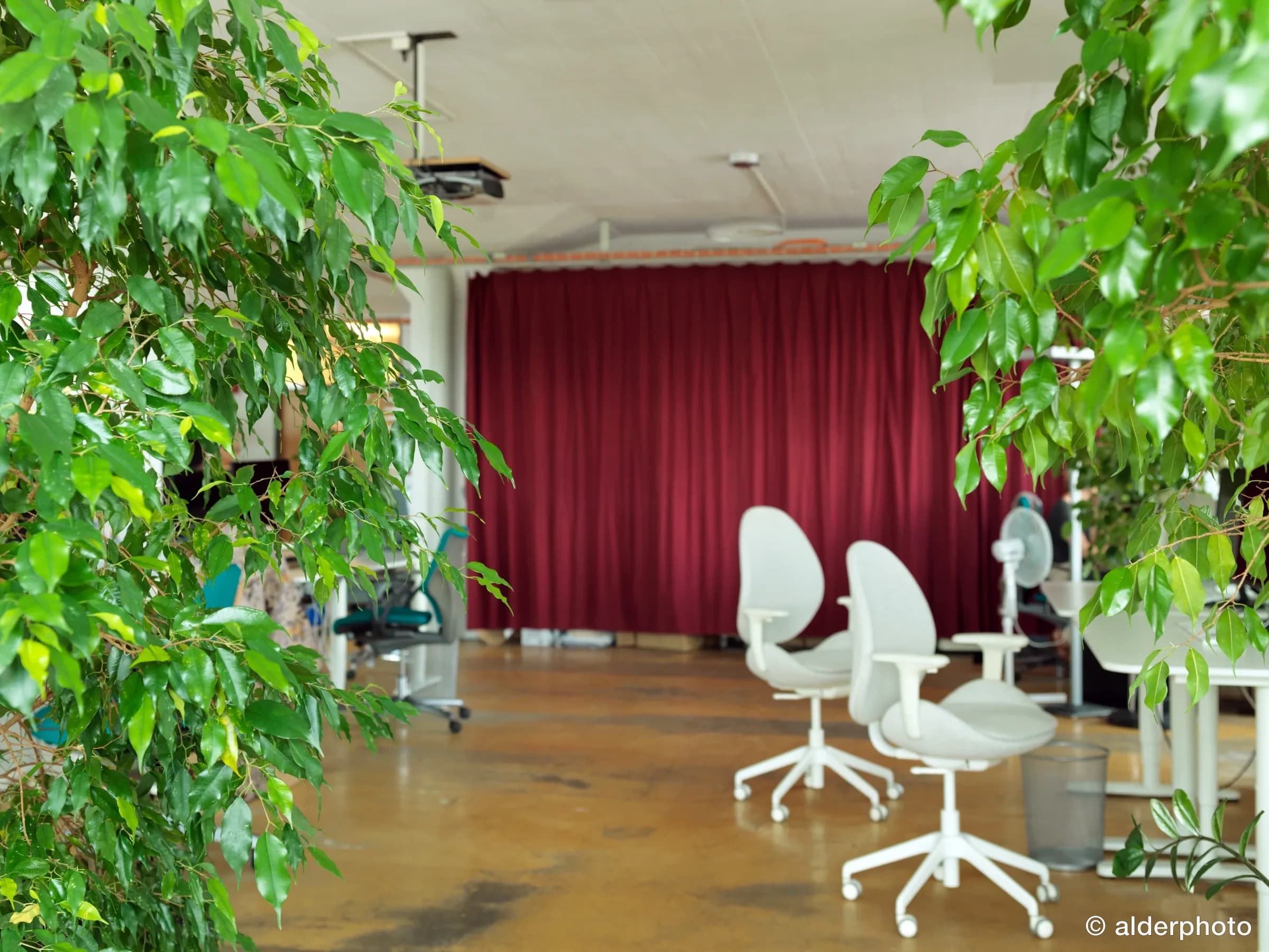 Lounge area with a red curtain